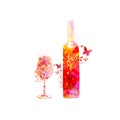 Elegant wine glass and bottle with flowers. Floral aroma wine in goblet. Colorful stemware with alcoholic beverage for celebration Royalty Free Stock Photo