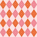 Mid century modern starbursts seamless pattern on pink and orange retro harlequin diamonds.