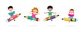 Children Posing With Pencil Character, Back to school, cartoon Children flying on pencil, kids riding big pencil in the sky Royalty Free Stock Photo