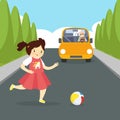 The girl ran for the ball on the road along which the car was driving Royalty Free Stock Photo
