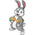 Cute rabbit carrying an easter eggs