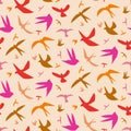 Colorful flying birds seamless pattern silhouette in orange, red, pink on light cream background. Royalty Free Stock Photo