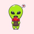 Cute alien holding love in wood bucket cartoon vector Illustration. Royalty Free Stock Photo
