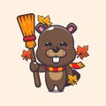 Cute autumn beaver holding broom.