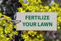 fertilize your lawn word on paper