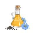 Black cumin seed oil in glass bottle. Nigella sativa flower and seeds. Royalty Free Stock Photo