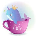 Cute little narwhal sitting inside the cup