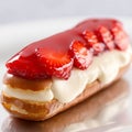 Chocolate eclairs with berries