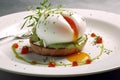 Poached egg on toast with avocado and cherry tomatoes