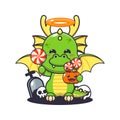 Cute angel dragon holding candy in halloween day.