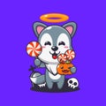 Cute angel wolf holding candy in halloween day. Cute halloween cartoon illustration.