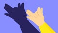 A hand with shadow play making a dog Royalty Free Stock Photo