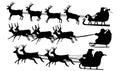 set of Christmas Santa Claus with his sled and reindeer silhouette Royalty Free Stock Photo