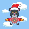 PrintCute panther wearing santa hat flying with plane. Cute christmas cartoon character illustration.