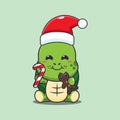 Cute turtle eating christmas cookies and candy. Cute christmas cartoon character illustration. Royalty Free Stock Photo
