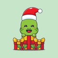 Cute turtle happy with christmas gift. Cute christmas cartoon character illustration. Royalty Free Stock Photo