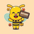 Cute bee with autumn sign board. Royalty Free Stock Photo