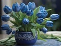 blue tulips in beautiful blue pots