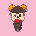 Cute ram sheep cartoon character holding love in wood bucket. Royalty Free Stock Photo