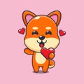 Cute shiba inu cartoon character holding love heart at valentine\'s day.