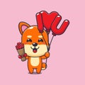 Cute shiba inu cartoon character holding love balloon and love flowers.