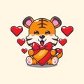 Cute tiger happy with love gift in valentine\'s day.