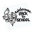 Welcome back to school hand drawn lettering on note paper background. Royalty Free Stock Photo