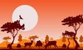 African savanna at sunset. Silhouettes of animals and plants. Royalty Free Stock Photo