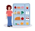 Eating disorder. Sad woman worries and eats from the refrigerator. Overeating. Food addiction concept Royalty Free Stock Photo