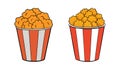 Two striped buckets filled with fluffy popcorn isolated on white background Royalty Free Stock Photo