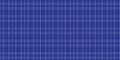 Blue plaid pattern featuring a classic tartan design with intersecting horizontal and vertical white lines Royalty Free Stock Photo