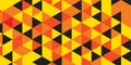 Geometric pattern with a repeating motif of triangles in yellow, orange, red, and black. Royalty Free Stock Photo