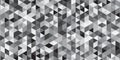 Geometric pattern with a series of interlocking triangles and quadrilaterals, creating a monochromatic grayscale mosaic Royalty Free Stock Photo