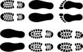 Collection of black footprint and shoe sole imprints Royalty Free Stock Photo