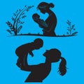Silhouette of baby in mother arms Royalty Free Stock Photo