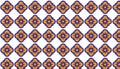 Repeating geometric pattern of stylized floral motifs, combination of blue and orange creates a striking contrast. Royalty Free Stock Photo