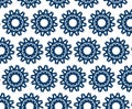 A repeating pattern featuring dark blue geometric designs forming circular, star-like shapes Royalty Free Stock Photo