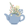 Beautiful blue teapot decorated with meadow flowers Royalty Free Stock Photo