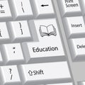education concept, book, computer keyboard Royalty Free Stock Photo