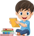 Cartoon little boy holding a book Royalty Free Stock Photo
