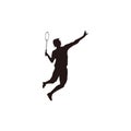 Silhouette of men badminton player jumping at court - silhouette of sport men are playing badminton attack with smashing shuttleco Royalty Free Stock Photo