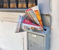 Printed advertising and promotional newspapers in the mailbox. Montopoli, Italy