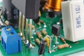 Printed circuit board with installed analogue electronic components closeup Royalty Free Stock Photo