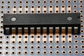 Printed circuit board and microchip closeup - electronic component for digital equipment, concept for development of electric