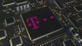 Computer printed circuit board or PCB with Deutsche Telekom AG logo. Conceptual editorial 3D rendering