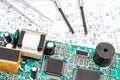 Printed circuit board, precision tools and diagram of electronics. Technology Royalty Free Stock Photo