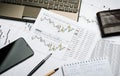 Printed financial charts of currencies, Forex, broker`s workplace