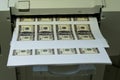 Printer printing fake dollar bills isolated on white