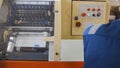 A printing machine controlled by a print operator