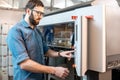 Printing operator working at the manufacturing